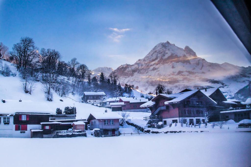 A Swiss town at sunrise during winter A Swiss town at sunrise during winter